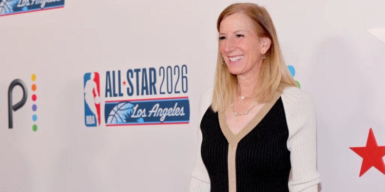 Cathy Engelbert smiling at the Los Angeles Clippers & Comcast NBCUniversal's NBA All-Star Legendary Tip-Off Celebration.