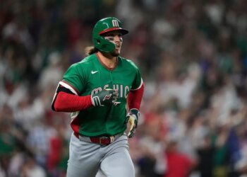 Jarren Duran running the bases after hitting a solo home run.