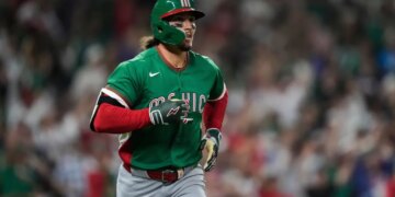 Jarren Duran running the bases after hitting a solo home run.