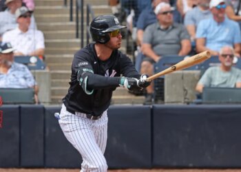 New York Yankees left fielder Cody Bellinger #35, flies out in the 1st inning.
