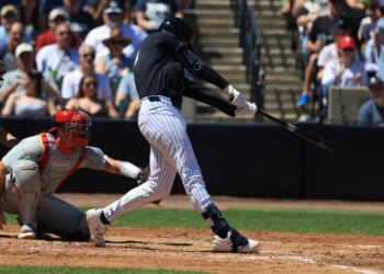 New York Yankees infielder Ryan McMahon hits an RBI single against the Philadelphia Phillies.