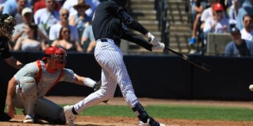 New York Yankees infielder Ryan McMahon hits an RBI single against the Philadelphia Phillies.