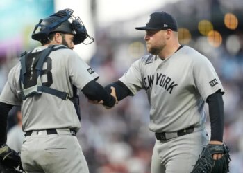 Austin Wells (left) celebrates with closer David Bednar after the Yankees' 3-1 win over the Giants at Oracle Park on March 28, 2026 in San Francisco.