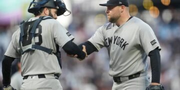 Austin Wells (left) celebrates with closer David Bednar after the Yankees' 3-1 win over the Giants at Oracle Park on March 28, 2026 in San Francisco.