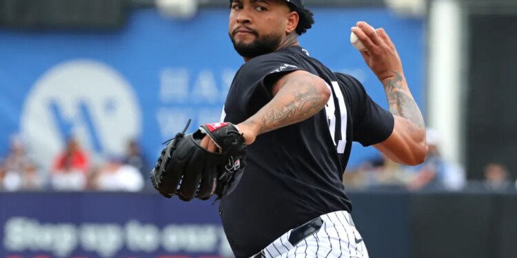 Luis Gil pitching during spring training.