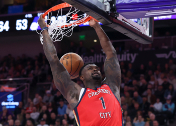 Zion Williamson of the New Orleans Pelicans dunks the ball against the Utah Jazz.