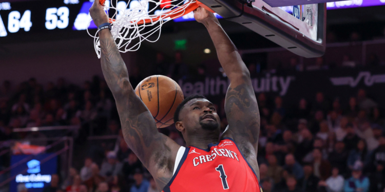 Zion Williamson of the New Orleans Pelicans dunks the ball against the Utah Jazz.