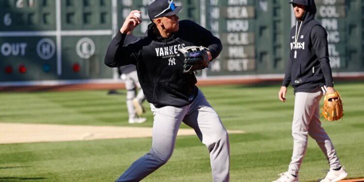 Aaron Judge warming up on the field during batting practice.