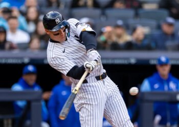 Aaron Judge (99) hits a two-run home run during the first inning at Yankee Stadium, Sunday, April 19, 2026, in Bronx, NY.