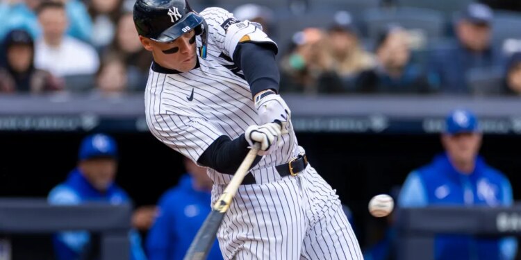 Aaron Judge (99) hits a two-run home run during the first inning at Yankee Stadium, Sunday, April 19, 2026, in Bronx, NY.