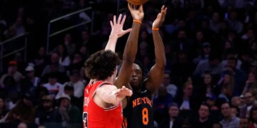 Knicks puts up a shot as guard Josh Giddey #3 of the Chicago Bulls defends during the first half at Madison Square Garden, Friday April 3rd, 2026, in New York, NY.