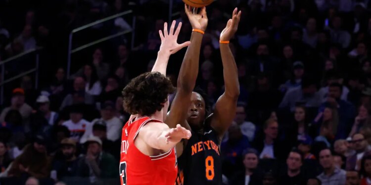 Knicks puts up a shot as guard Josh Giddey #3 of the Chicago Bulls defends during the first half at Madison Square Garden, Friday April 3rd, 2026, in New York, NY.