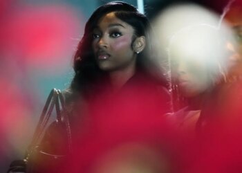 Angel Reese at a news conference.