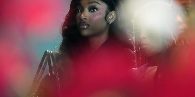 Angel Reese at a news conference.