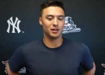 Anthony Volpe talks to reporters after his first rehab game with the Somerset Patriots on April 14, 2026.