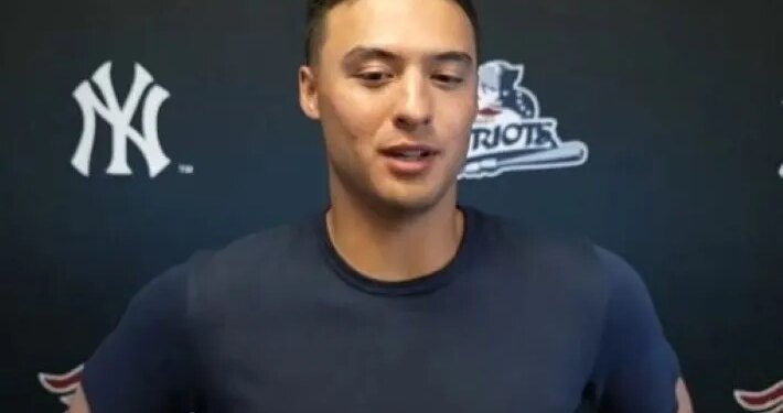Anthony Volpe talks to reporters after his first rehab game with the Somerset Patriots on April 14, 2026.