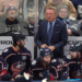 Columbus Blue Jackets coach Rick Bowness, center top, looks on during the third period of an NHL hockey game against the Winnipeg Jets in Columbus, Ohio, Saturday, April 4, 2026.