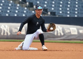New York Yankees shortstop Anthony Volpe #11, catching throws at 2nd base from the outfield during a workout at Steinbrenner Field in Tampa, Florida.

