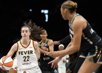 Caitlin Clark looks to make a move between defenders during the Liberty's 109-91 preseason loss to the Fever on April 25, 20267 at Barclays Center.