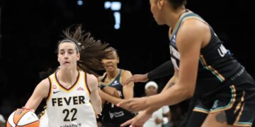 Caitlin Clark looks to make a move between defenders during the Liberty's 109-91 preseason loss to the Fever on April 25, 20267 at Barclays Center.