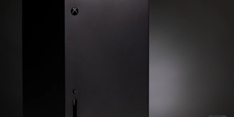 The Xbox Series X in front of a black background.