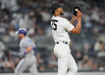 New York Yankees pitcher Camilo Doval (75) reacts as Kansas City Royals' Vinnie Pasquantino runs the bases after hitting a home run during the eighth inning of a baseball game Friday, April 17, 2026, in New York.