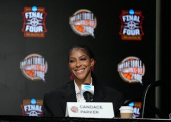 Candace Parker smiling at a press conference.