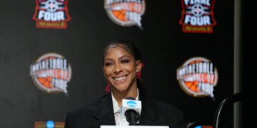 Candace Parker smiling at a press conference.