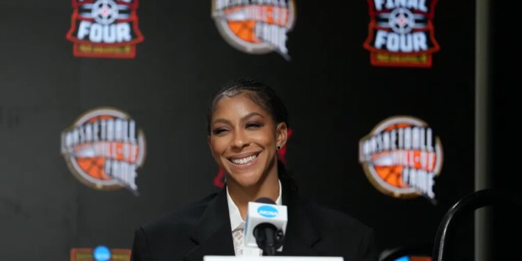 Candace Parker smiling at a press conference.