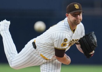 San Diego Padres pitcher Michael King mid-throw.