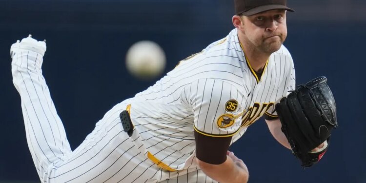 San Diego Padres pitcher Michael King mid-throw.