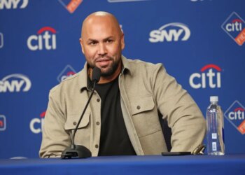 Carlos Beltran speaks at a press conference.