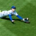 New York Mets outfielder Carson Benge diving to catch a fly ball.