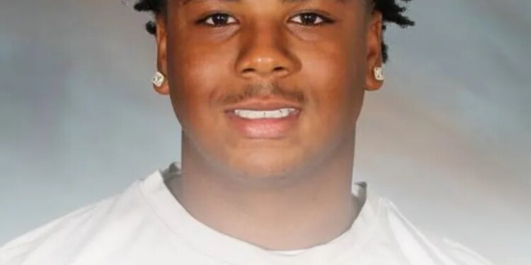 A tribute image for Ryder Barnes, featuring his smiling portrait and the text "FOREVER IN OUR HEARTS Ryder Barnes" and a Bible verse.