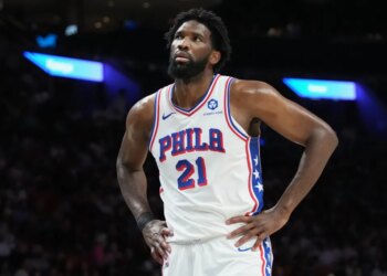 Philadelphia 76ers center Joel Embiid (21) reacts during the second half of an NBA basketball game against the Miami Heat, Monday, March 30, 2026, in Miami.