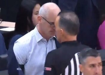 UConn head coach Dan Hurley (l.) puts his forehead on the forehead of referee Roger Ayers (r.) after Huskies freshman Braylon Mullins' game-winning 3-pointer against Duke on March 29, 2026.