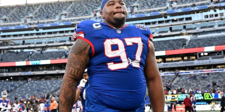 Giants defensive tackle Dexter Lawrence II (97) walking off the field.