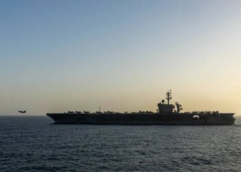 An F/A-18 fighter jet takes off from the USS Abraham Lincoln aircraft carrier in the Arabian Sea.