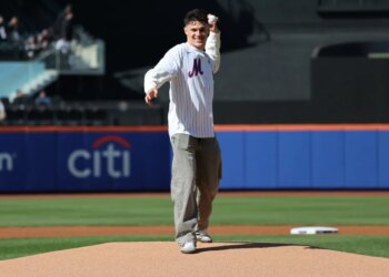 St. John's guard Dylan Darling is all smiles as he throws out the first pitch of the Mets-Diamondbacks game on April 8, 2026 at Citi Field.