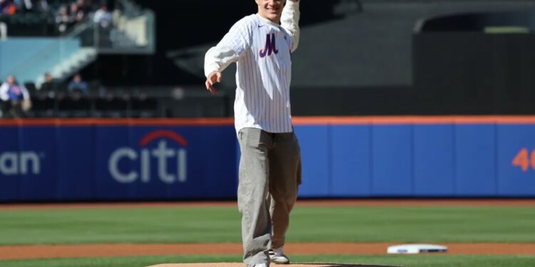 St. John's guard Dylan Darling is all smiles as he throws out the first pitch of the Mets-Diamondbacks game on April 8, 2026 at Citi Field.