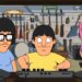 Illustration of Tina, Gene, and Louise from Bob's Burgers inside a music store, with Gene playing a sound mixer.