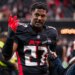 Atlanta Falcons linebacker James Pearce Jr. being interviewed after a football game.