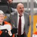 Philadelphia Flyers head coach Rick Tocchet yelling from the bench during a hockey game.