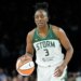 Seattle Storm forward Nneka Ogwumike dribbling a basketball.