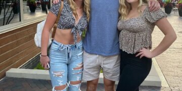 Former Wisconsin Badgers tight end Jack Pugh with two women.
