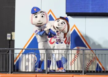 While a Taylor Swift song plays, Mr. Met puts a ring on Mrs. Mets finger when the New York Mets played the Philadelphia Phillies Tuesday, August 26, 2025 at Citi Field in Queens, NY.
