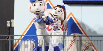 While a Taylor Swift song plays, Mr. Met puts a ring on Mrs. Mets finger when the New York Mets played the Philadelphia Phillies Tuesday, August 26, 2025 at Citi Field in Queens, NY.