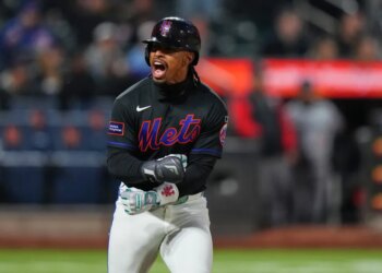 Francisco Lindor of the New York Mets celebrates after hitting a home run.