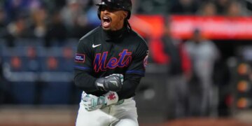 Francisco Lindor of the New York Mets celebrates after hitting a home run.