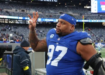 New York Giants defensive tackle Dexter Lawrence II (97) waves to fans after defeating the Dallas Cowboys.